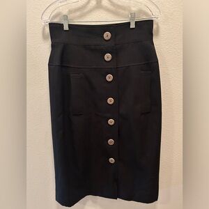 Vintage 80’s Saint Laurent black high waisted maxi skirt.